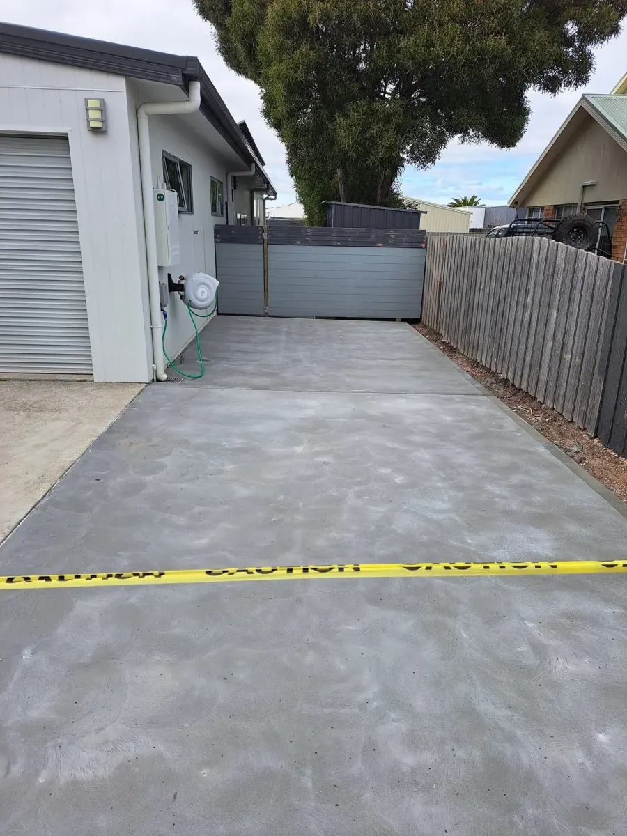 The same driveway rebuilt with fresh concrete