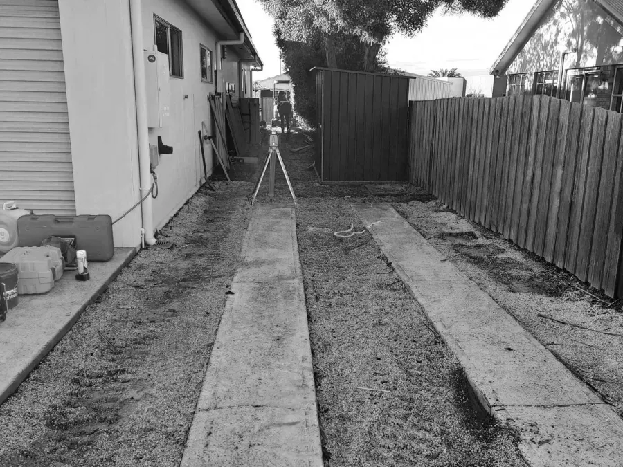 Driveway before, worn and uneven