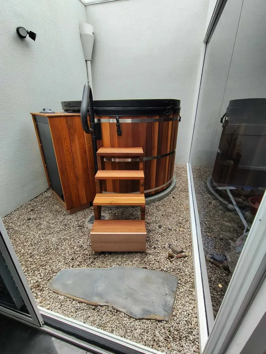 Hot tub set into a timber deck
